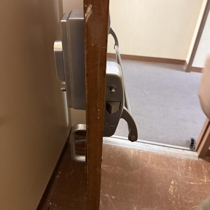 Kaba Simplex access control keypad on stairwell door