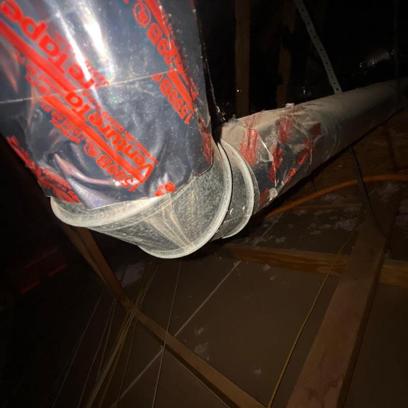 Flexible ductwork with insulation repair in attic space