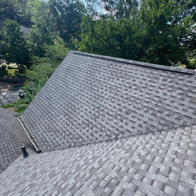 Asphalt shingle roof with hail damage and granule loss