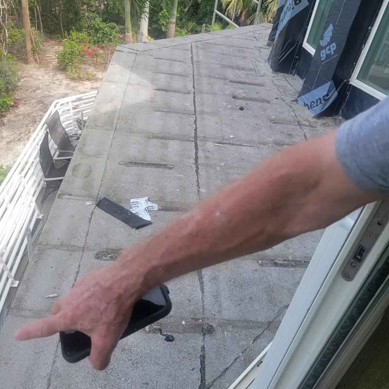 Flat roof inspection with water damage on Sanibel Island