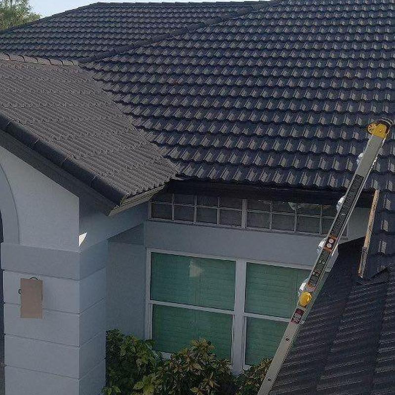 Stone-coated steel tile roof in charcoal color