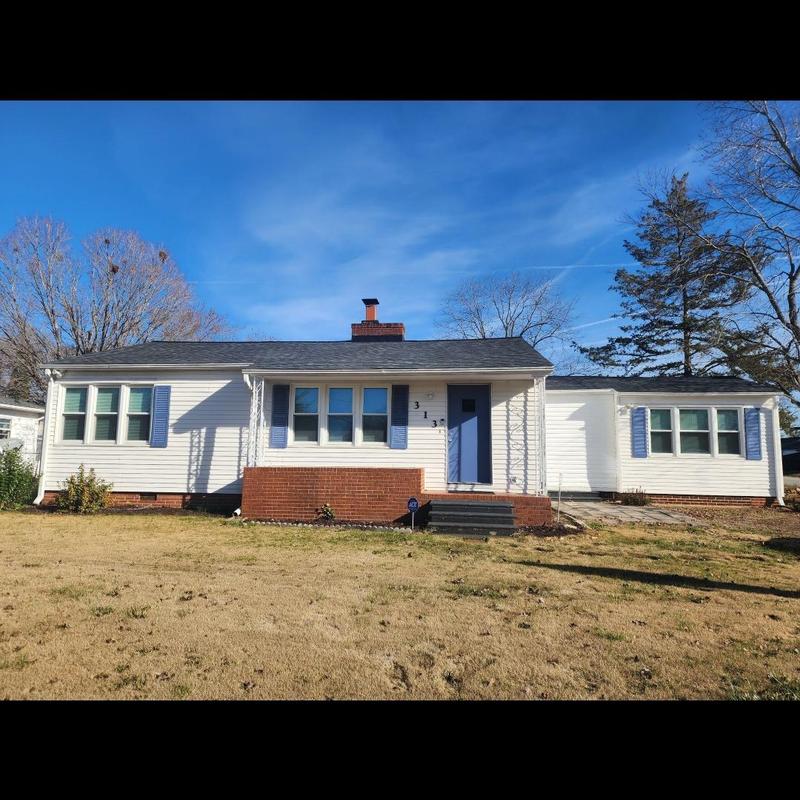 Chimney flashing on residential roof in Moore, SC