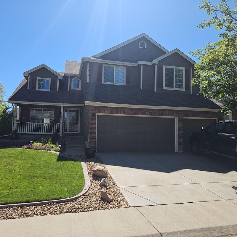 Shingle roof with hail damage inspection on residential home