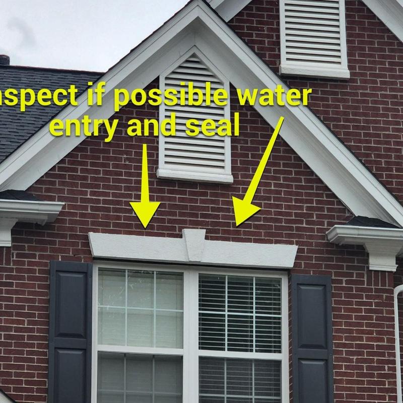 Wall flashing around brick window sealed for leaks