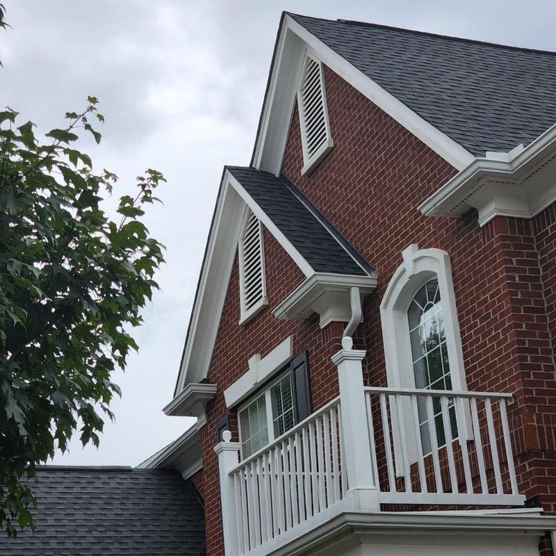 Wall flashing sealing on rooftop of brick home