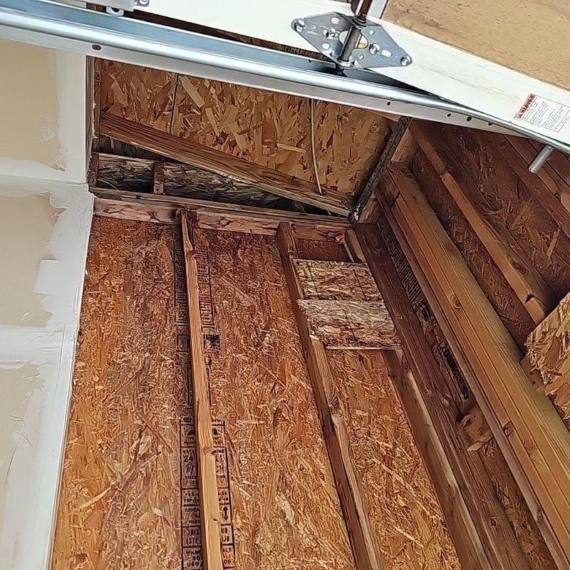 Garage door frame wood damage inspection and repair estimate