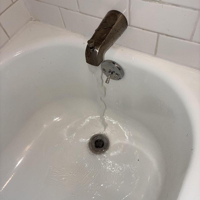 Tub drain flowing after cable cleaning service