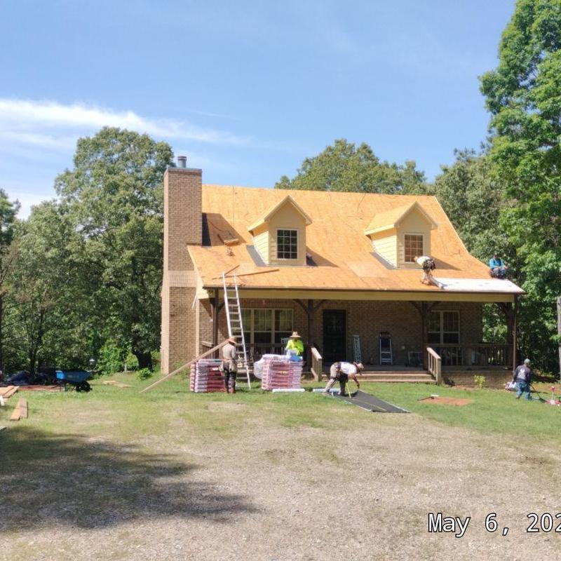 Owens Corning Oakridge asphalt roof installation outdoors