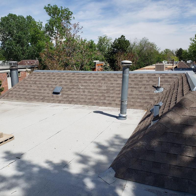 Shingle roof with vent pipes during hail inspection