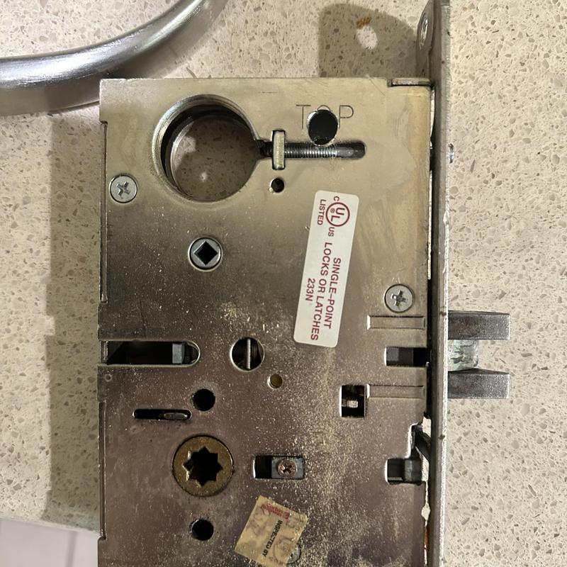 Single-point commercial door lock cylinder repair