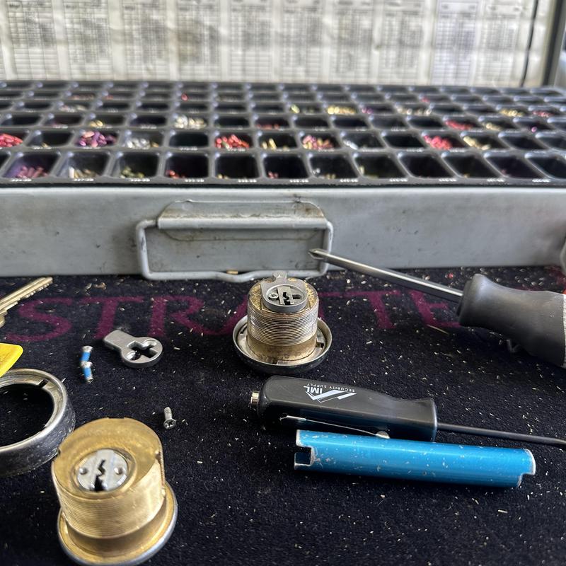 Commercial door lock cylinder with locksmith tools