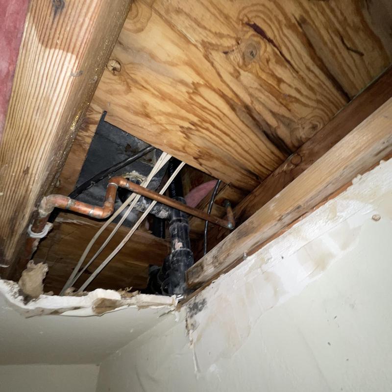 Copper water piping in ceiling with drywall removed