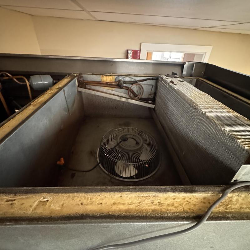 Reach-in cooler motor and evaporator coil inside unit