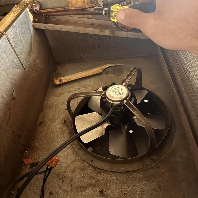 Reach-in cooler motor installation with screwdriver hand