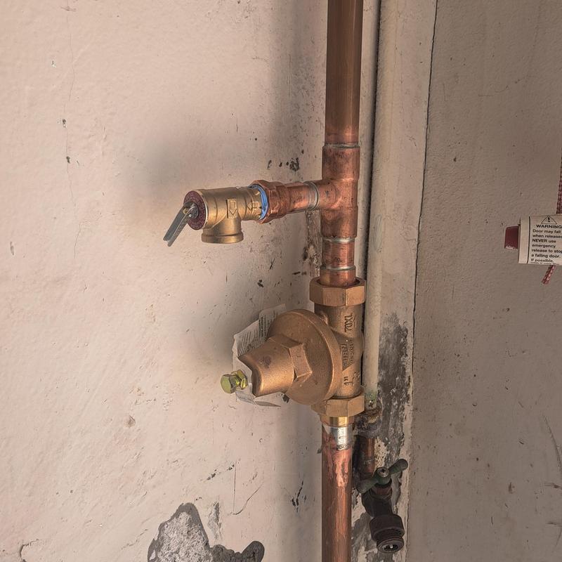 Pressure relief valve and regulator on copper water main