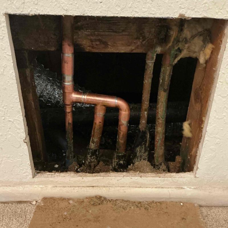 Copper plumbing manifold with new fittings installed