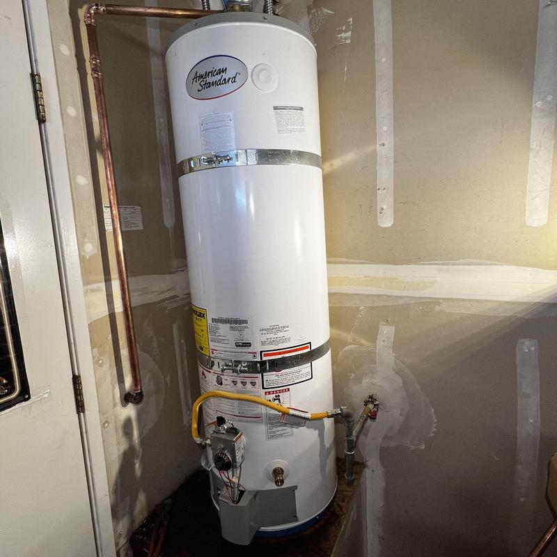 Water heater with copper pipes and gas line installed