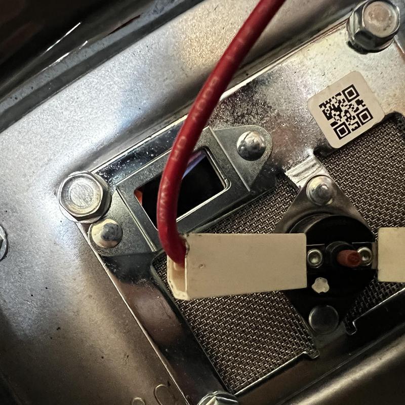 Gas valve and ignition wires on water heater assembly