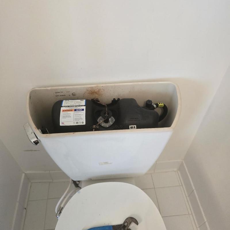 Flushmate power flush system inside toilet tank installation