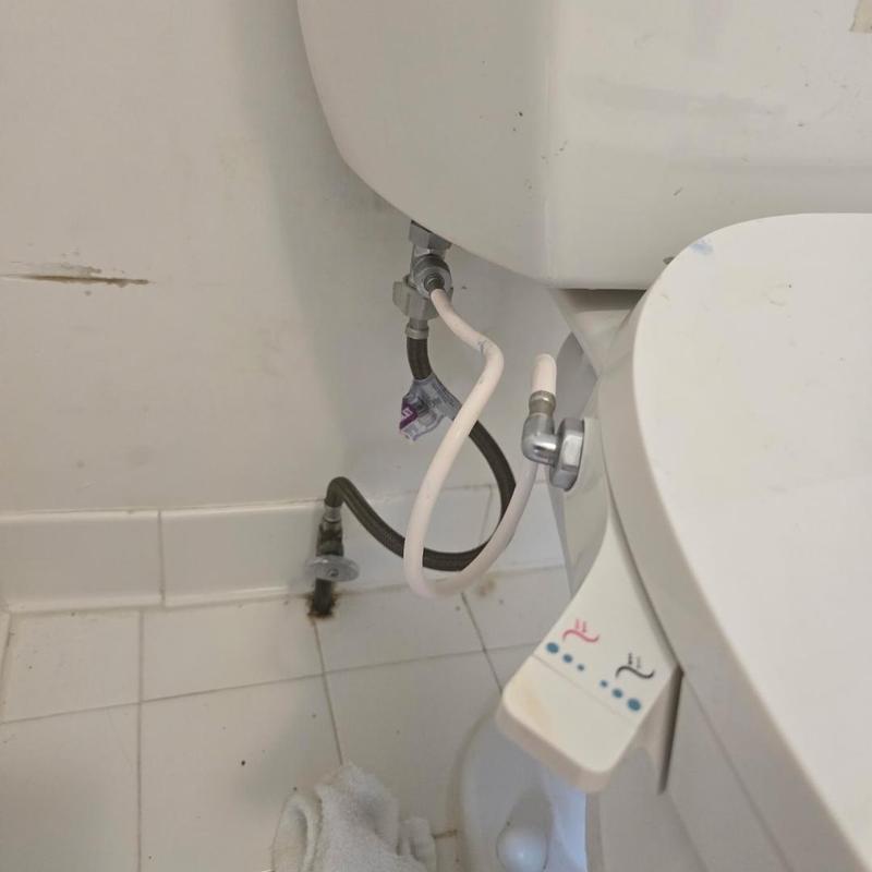 Flushmate power flush system installation on toilet tank