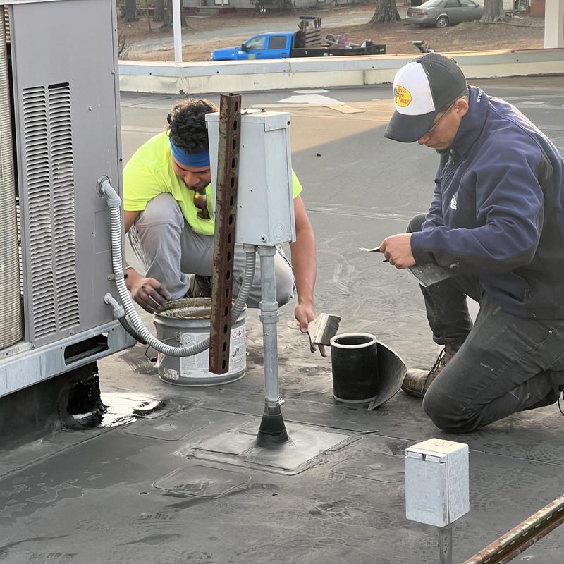 EPDM roof seam repair with primer and cover tape