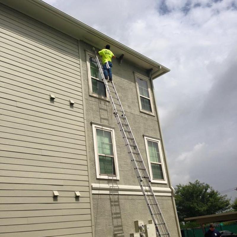 Soffit and fascia repair on two-story apartment building