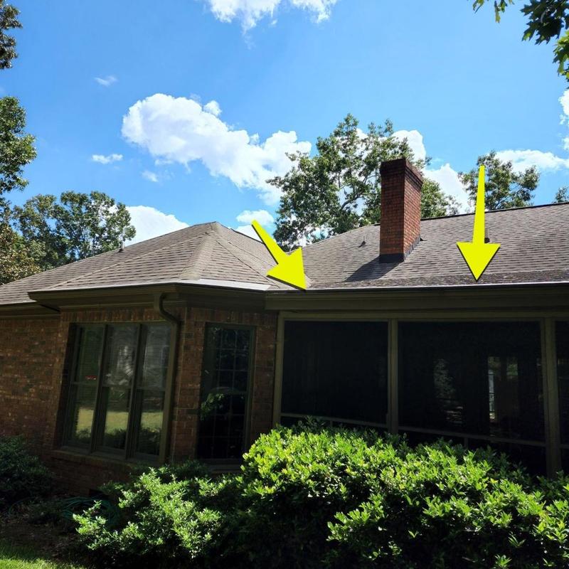 Roof pipe boot leaks with yellow repair markers Roof pipe boot leaks with yellow repair markers
