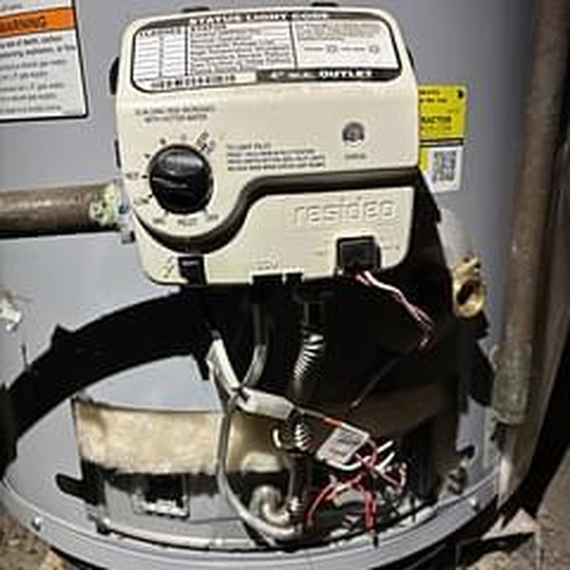 Water heater control dial with temperature setting adjustment