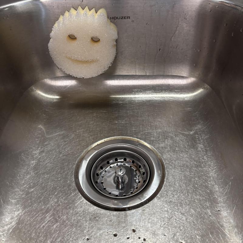 Kitchen sink stainless steel drain and smiley sponge