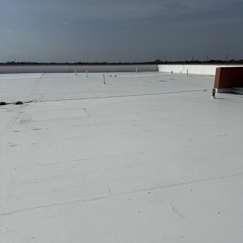TPO commercial flat roof with piping vents
