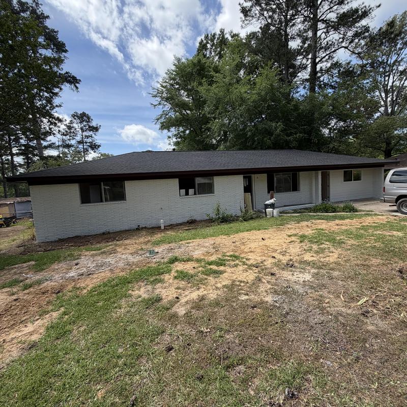 Exterior brick wall paint on residential home