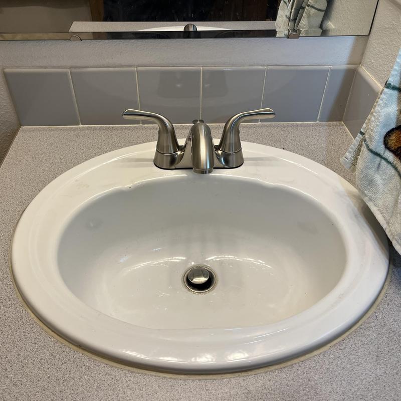 Lavatory faucet with new braided supply lines installed