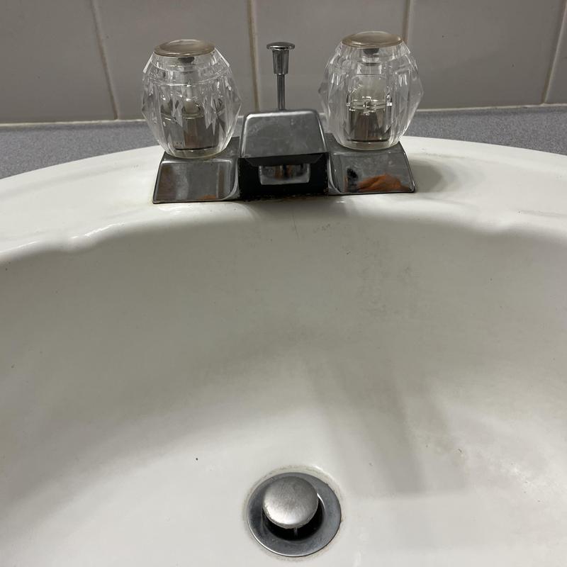 Lavatory faucet with clear handles and drain stopper