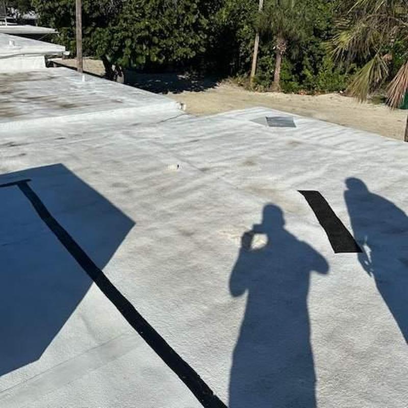 SPF spray foam roof coating inspection on flat roof