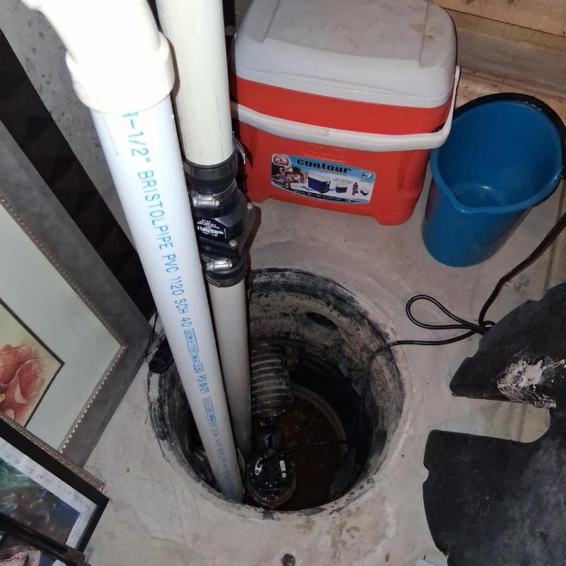 Sump pump system and PVC pipes in basement hole