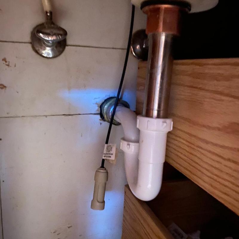 Bathroom sink P-trap and stopper assembly replacement