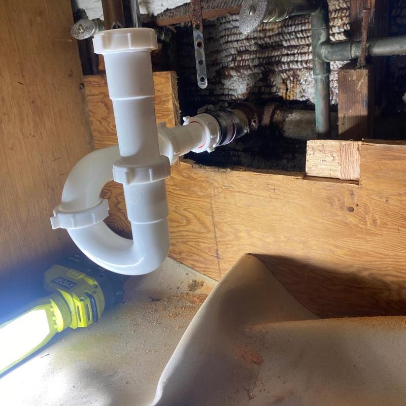 Bathroom sink P-trap installation with new fittings