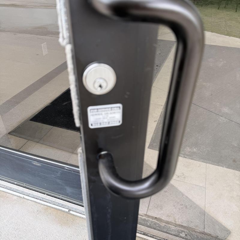 Mortise key cylinder installed on glass door handle