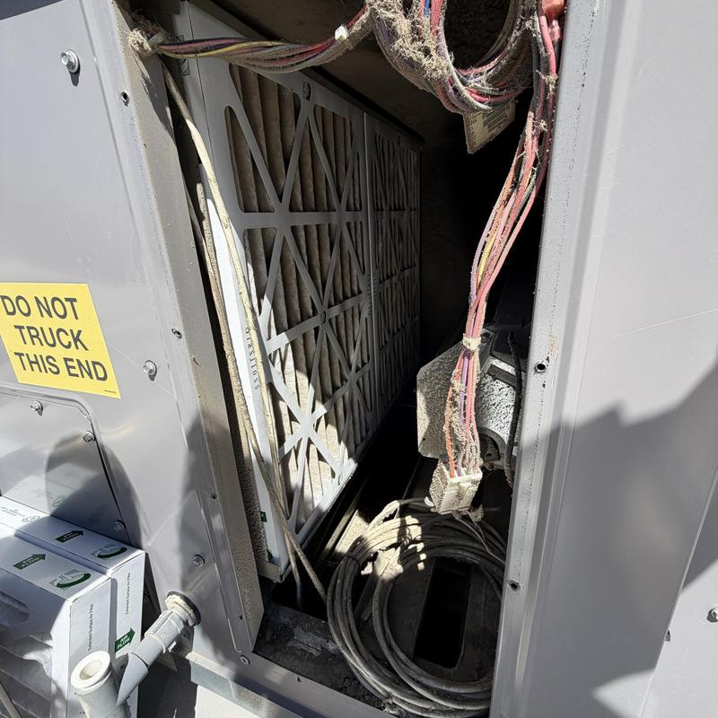HVAC air filter and wiring inside unit panel
