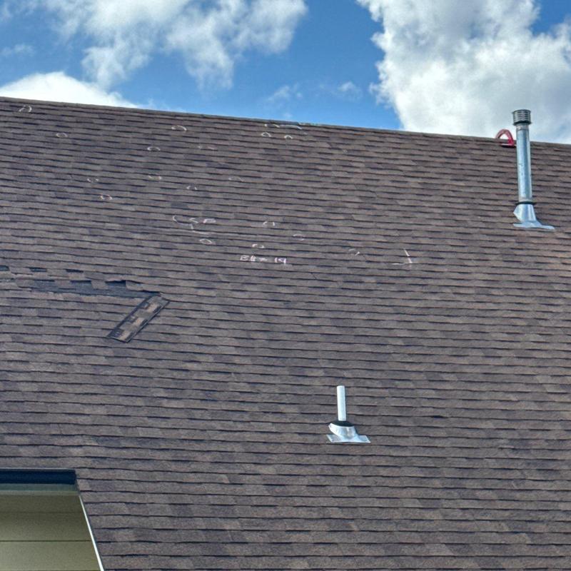 Owens Corning Oakridge asphalt shingle roof damage marks