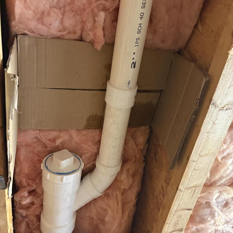 Kitchen drain PVC pipe with cleanout and insulation