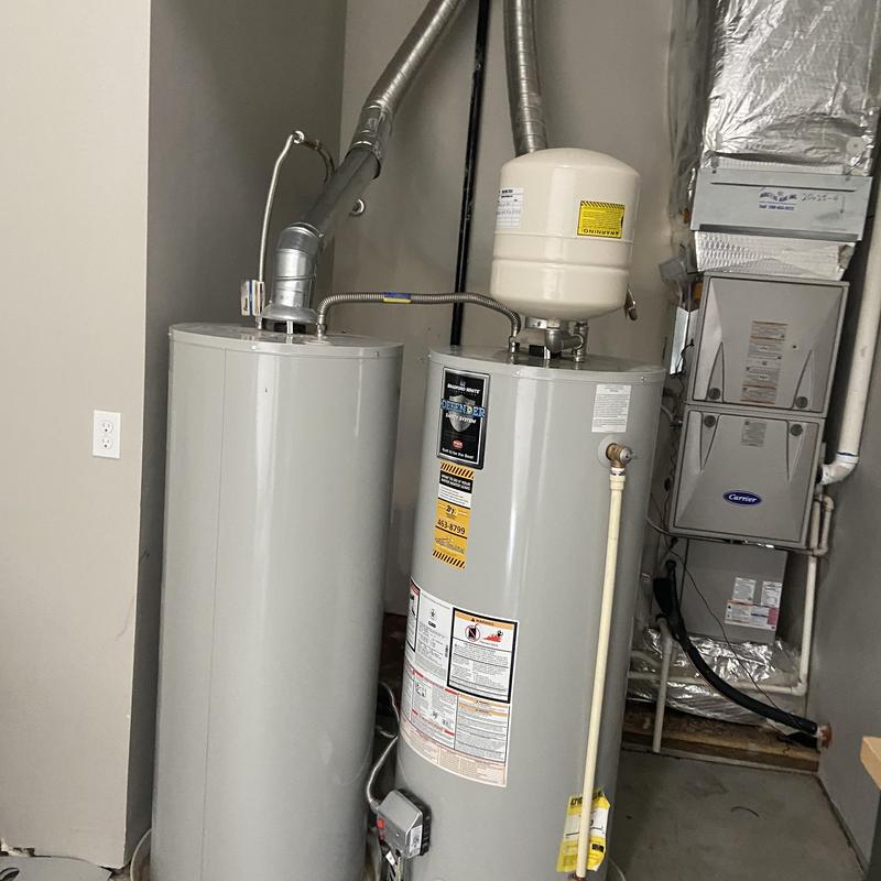 Water heaters with expansion tank and ventilation ducts