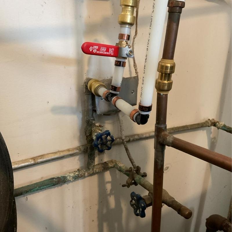 Water heater repiping with new PEX tubing and valves