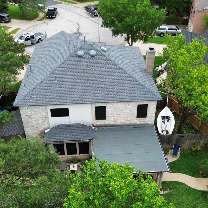 GAF slate roof with ridge venting on two-story home