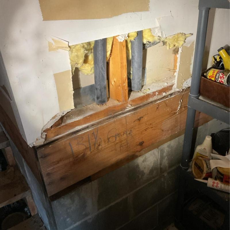 Water heater cold side pipes inside wall with insulation