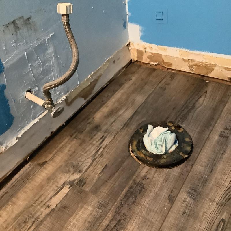 Toilet flange and water supply valve in bathroom remodel