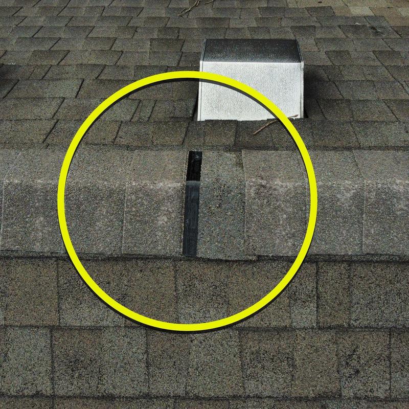 Asphalt roof shingles with hail damage and granule loss