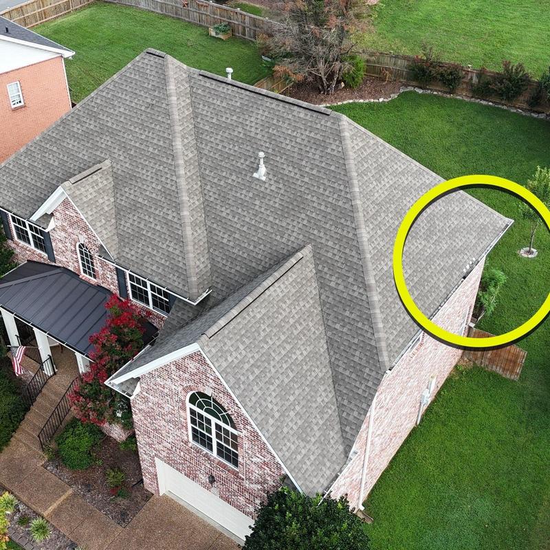 Shingles and flashing hail damage on residential roof