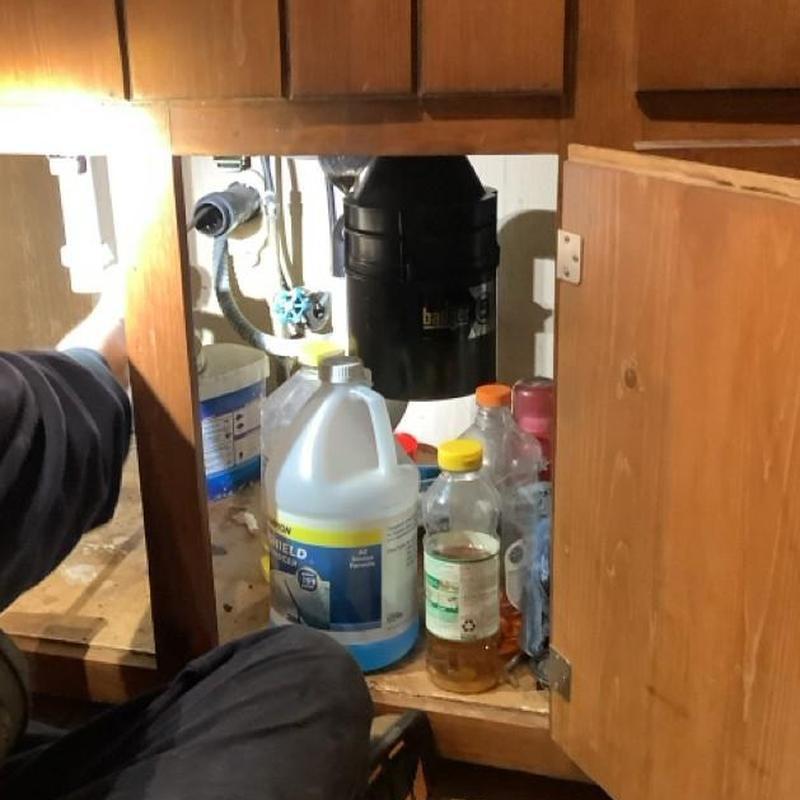 Kitchen drain line with garbage disposal cleaning Kitchen drain line with garbage disposal cleaning