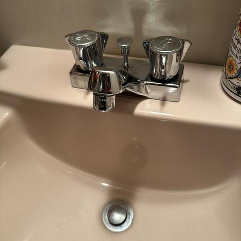 Basin faucet with new angle stops and supply hoses